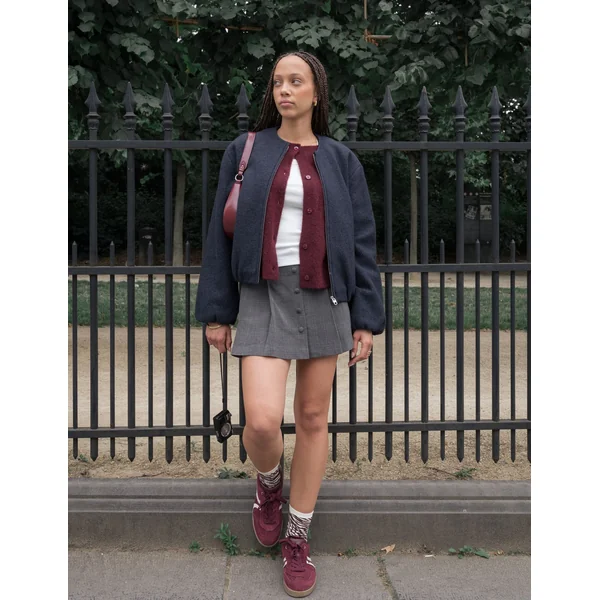 Jupe short plissée à carreaux Noir