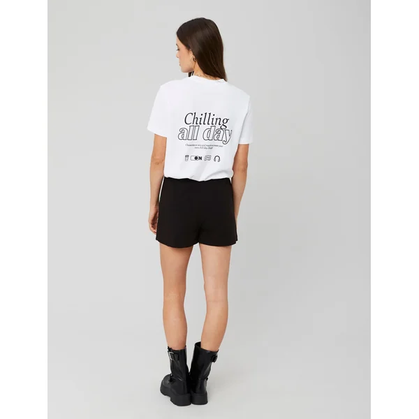 Jupe short portefeuille avec bouton doré Noir