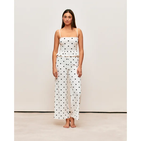 Pantalon matière texturée motifs à pois