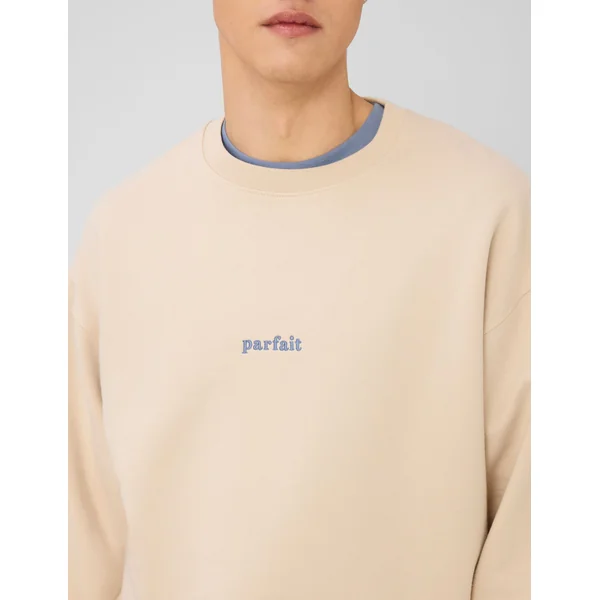 Sweat col rond broderie poitrine Blanc cassé