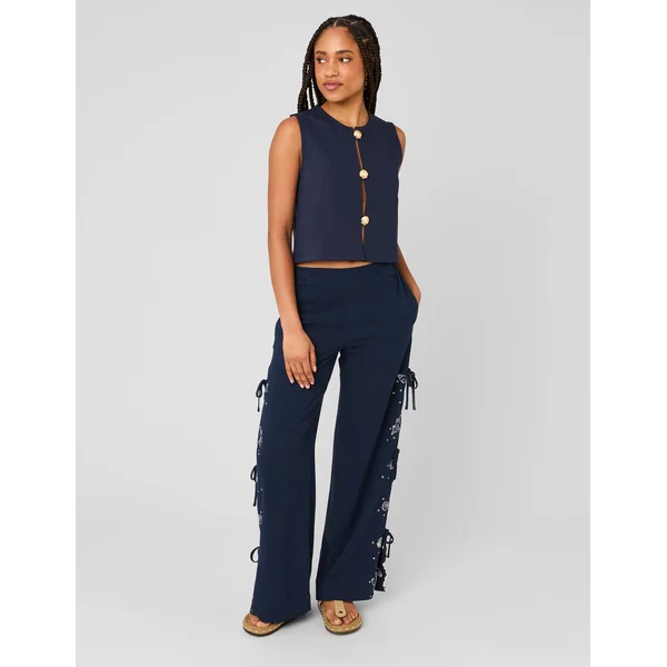 Top avec détails de boutons dorés Bleu foncé