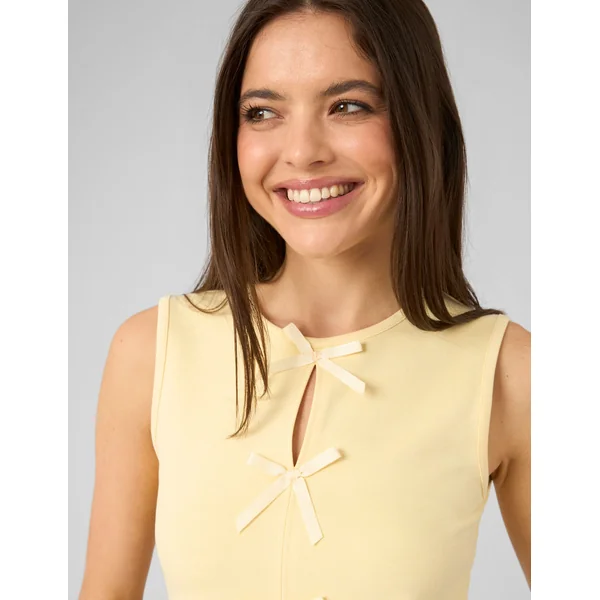 Top sans manches à nœuds JAUNE PASTEL
